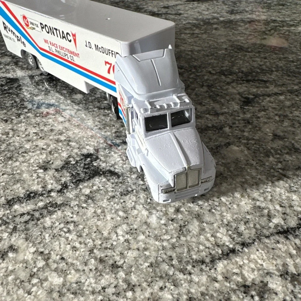American Racing 1991 Scene #6 J. D.‎ McDuffie Pontiac Mack Transporter Pontiac